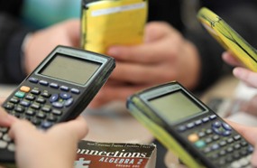 Students holding calculators 